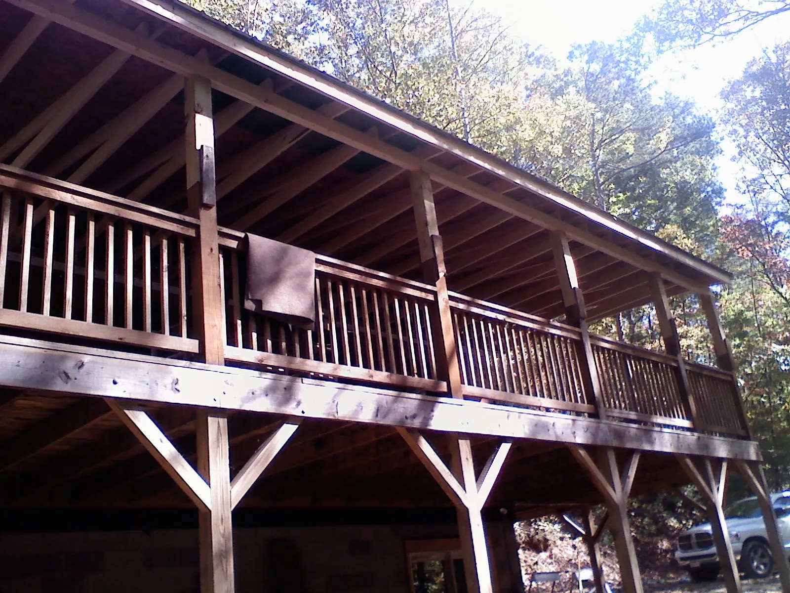 Timber framing under a new elevated porch and deck — Roof Leak Repair in Tampico by Roofing Brothers